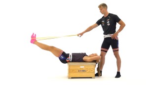 Rowers performing a rowing exercise.
