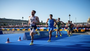 An athlete running in a triathlon competition.