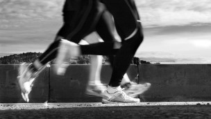 Black and white photo of someone running.